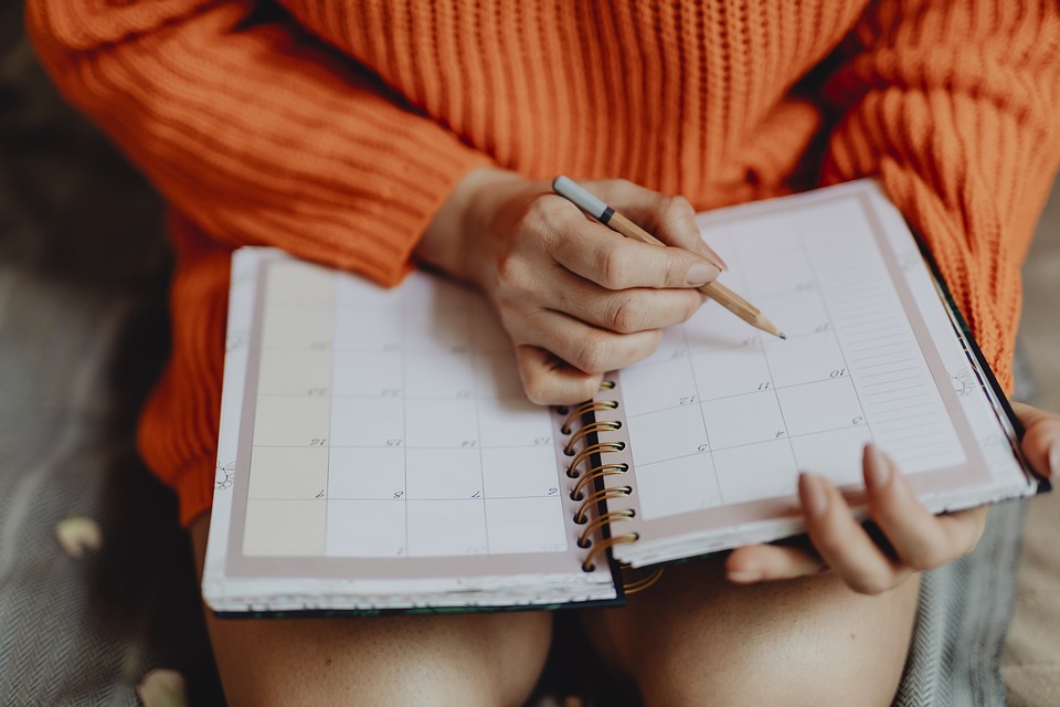 woman looking at calendar